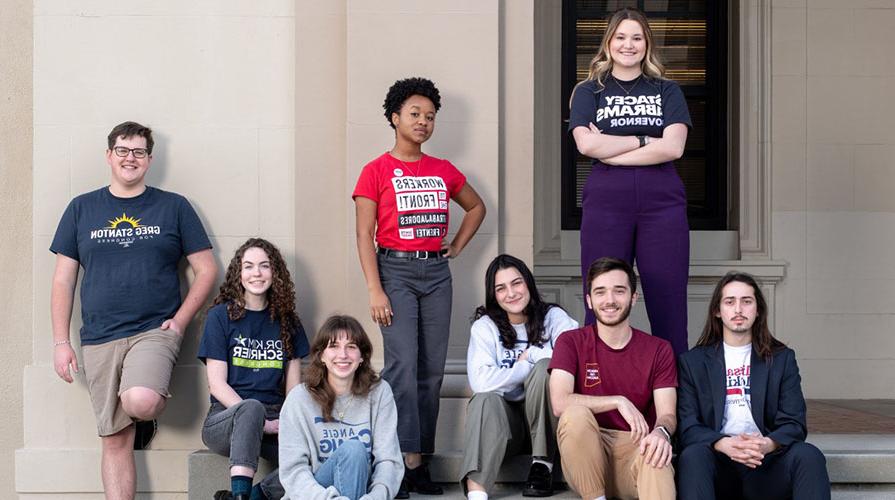 Oxy campaign semester students posing in front of a wall