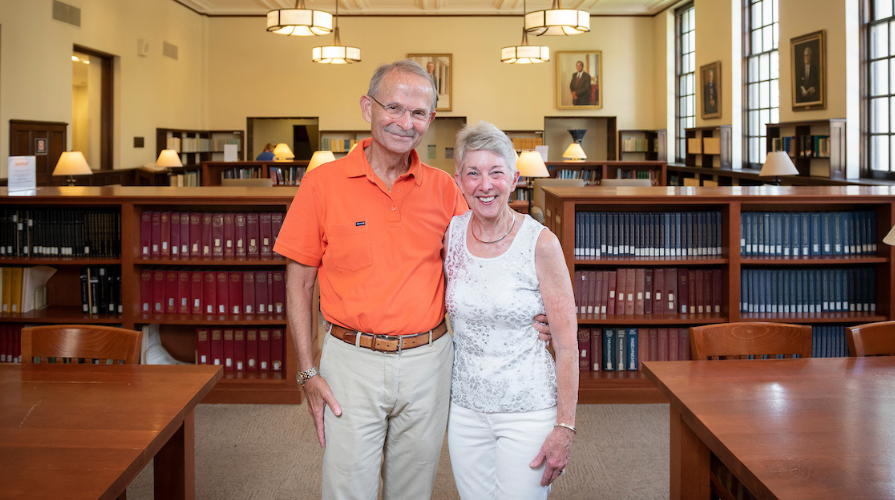 Portrait of Barbara and Michael Gibby in the Occidental College library