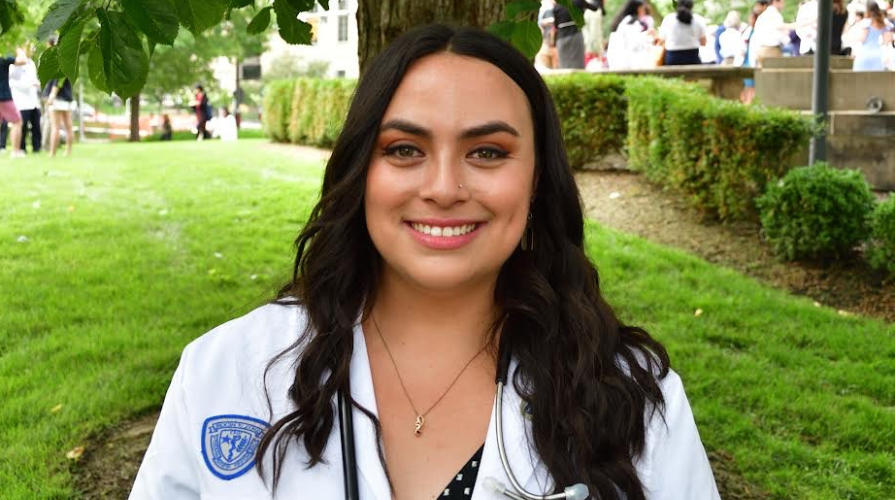 Hollie Adams in a white coat