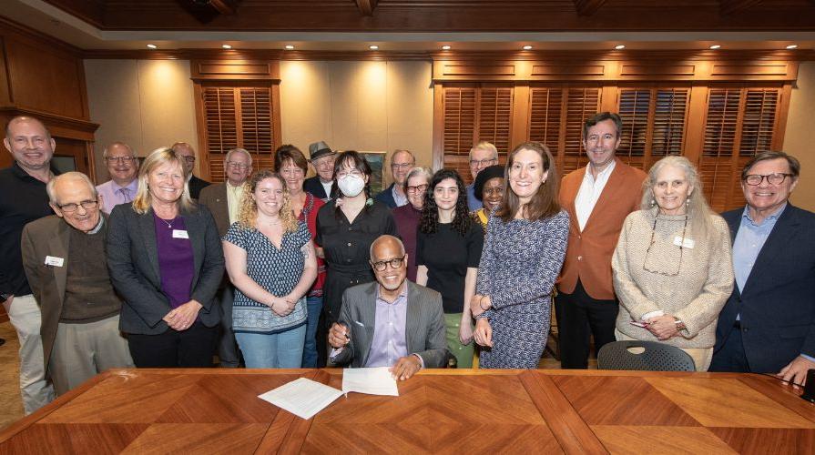 President Harry J. Elam, Jr. signs the Second Nature Climate Pledge