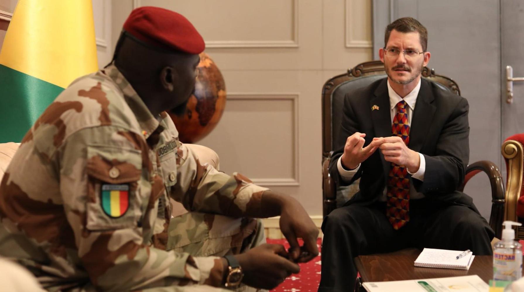 Michael Gonzales '96 with Guinean Transition President Mamady Doumbouya.