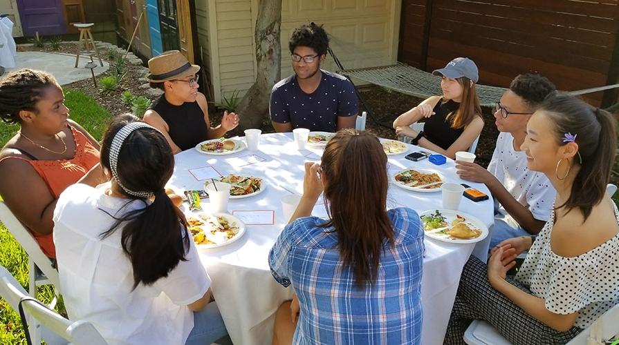 Students sitting at a table at a MVP event