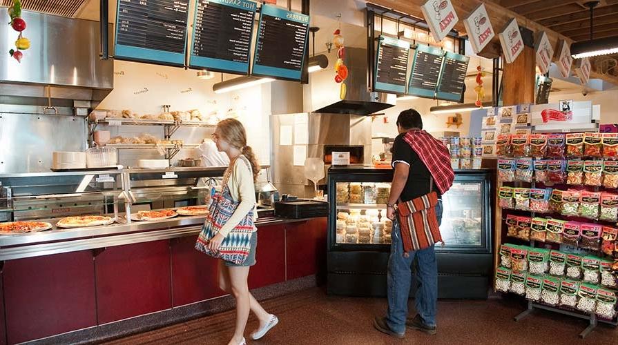 Students grab a snack at the Tiger Cooler