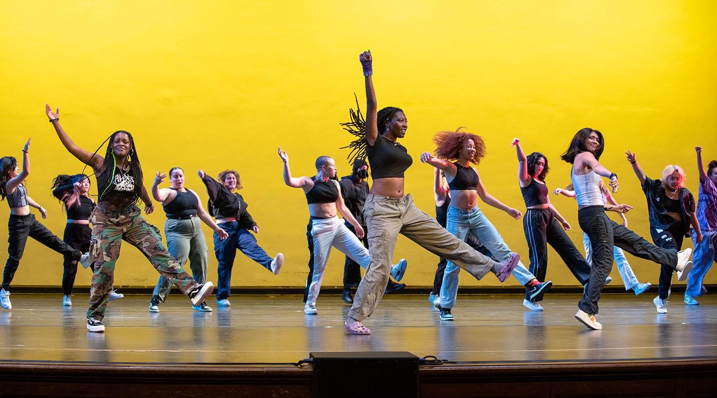 Students dancing on stage in Thorne Hall for Dance Pro 2023