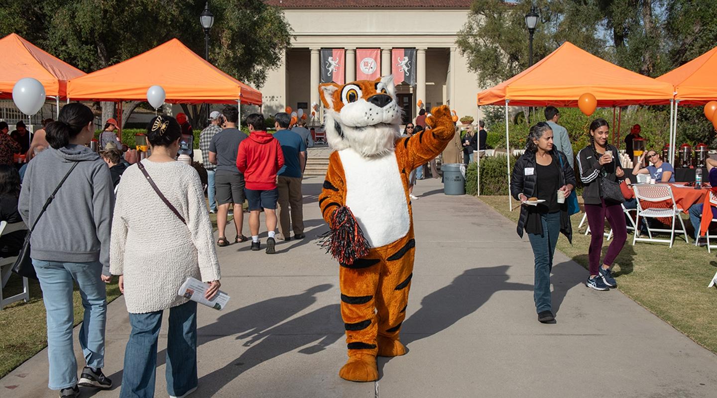 Oswald greets visitors to campus during Explore Occidental Fall Preview Day in November 2023.