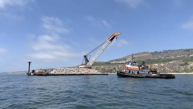 a crane off the coast of the Palos Verdes Peninsula