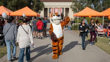 Oswald greets visitors to campus during Explore Occidental Fall Preview Day in November 2023.