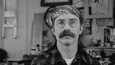 Jim Conlin '74 at home in his garage in Rochester, N.Y., in an undated photo.