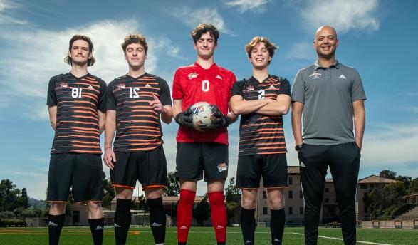 Coach Rod Lafaurie and members of the 2023 men's soccer team