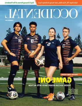 Four student athletes stand on a green field. Cover story: "