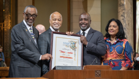 President Harry J. 拦,小. is recognized by members of the Los Angeles City Council