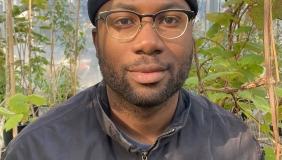 Marvin Browne in front of plants