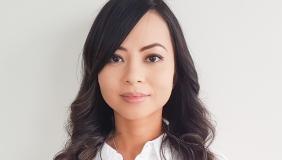 Woman in white shirt in front of white background