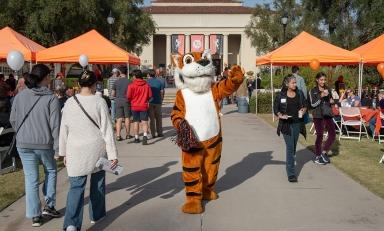 Oswald greets visitors to campus during Explore Occidental Fall Preview Day in November 2023.