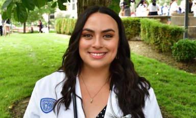 Hollie Adams in a white coat