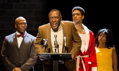 A performance of Fetch Clay, Make Man featuring four Black actors onstage