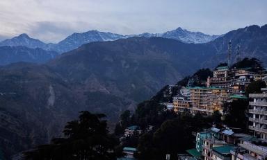 A view of the mountains from a village in the Himalayas.