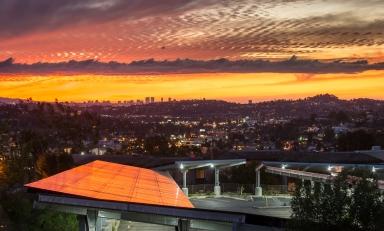 Occidental's solar array reflects a colorful sunset in 2014. 