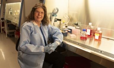 Professor of Biology Roberta Pollock, photographed in her lab in April 2024.