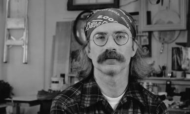 Jim Conlin '74 at home in his garage in Rochester, N.Y., in an undated photo.