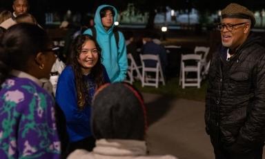 President Elam talks to students at Moonlight Breakfast on the Quad in December 2022.