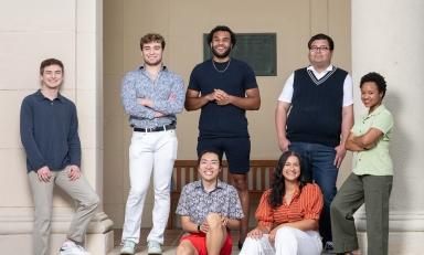 a group of 7 Obama Scholars students standing together outside